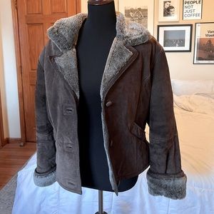 Genuine leather winter coat with faux fur collar and inside lining. Super warm!!